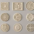 Ornate Carved Decorations In Various Shapes With Floral And Geometric Patterns For Home Decor
