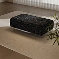 Black Patterned Fabric Bench With Metal Legs On Beige Rug Near Window Plant