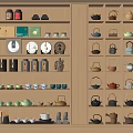 Chinese Style Wooden Display Cabinet With Neatly Arranged Tea Sets Teapots Cups And Canisters