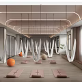 Modern Yoga Studio With Aerial Hammocks Yoga Mats And Orange Exercise Balls