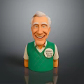 Smiling Man in Green Argyle Vest with Chipper Chief Badge Cartoon Figurine