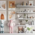 Decorative Ornament Combination Featuring Wall Art Prints Colorful Figurines With Books Vases Plants On Shelves