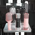 Stylish Headphones And Speakers In Pink Black Silver With Display Stand