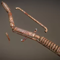 Rusted Metal Hand Tool With Coiled Spring And Curved Metal Parts