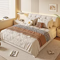 Cozy Modern Bedroom Interior With Upholstered Headboard Multiple Pillows Quilted Bedspread And Warm Carpet