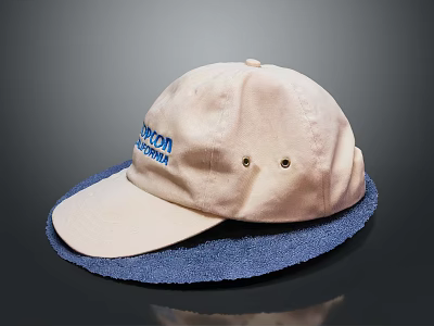 Beige Boston Cap With Blue Lettering Placed On Soft Blue Mat 3d model