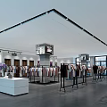 Modern Clothing Store Interior With Spacious Layout And Clothing Racks Displaying Various Clothes