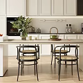 Modern Restaurant Kitchen Interior With White Cabinets Island Counter Chairs Plant And Natural Light