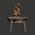 Rustic Wooden Table With Hand Carved Decorative Figure On Top