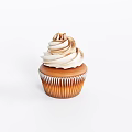 Delicious Cupcake With Creamy Frosting Brown Swirls In Brown Paper Liner On White Background