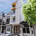 Modern Detached Villa Exterior With Vertical Slats Planter Balcony And Entrance Steps