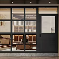 Modern Black Door With Glass Panels Showing Interior Sofa And Bookshelves