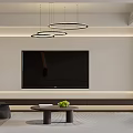 Modern Living Dining Room With Black Sofa Round Coffee Table Piano And Ring Pendant Lights