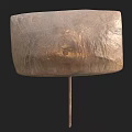 Other Square Metal Object With Textured Surface And Long Thin Rod