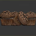 Freshly Baked Chocolate Muffins Topped with Chocolate Chips and Fudgy Centers