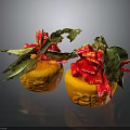 Textured Decorated Oranges With Red Ribbons Green Leaves And Chilies On Black Background