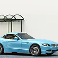 Light Blue Sports Car Parked With Green Canopy And White Background Wall