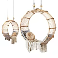 Cozy Round Rattan Hanging Chair with Soft Cushions and Natural Linen Blanket