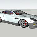 Sleek White Two Door Sports Car With Large Wheels And Red Brake Calipers