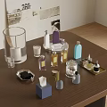 Stylish Bathroom Accessories Collection With Glass Containers Perfume Bottles And Trays On Wooden Table