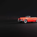 Red Vintage Convertible Car With Classic Chrome Grille And White Wall Tires