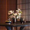 Elegant Vase With White And Purple Flowers On Black Round Table With Wooden Lattice Wall