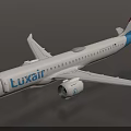 Luxair Airplane With White Body Red And Blue Tail Wings And Engine