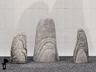 Natural Stone Sculptures With Wooden Accents Against White Tiled Wall And Gravel Ground 3d model