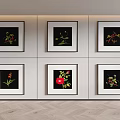 Six Floral Decorative Paintings With Black Frames On White Wall Interior