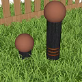 Outdoor Lights with Round Shades Dark Poles and White Stripes on Grass by Wooden Fence