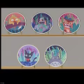Five Round Cartoon Plates With Various Designs Displayed On Light Wooden Shelves