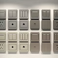 Various Gray Electrical Switch Panels With Different Designs And Sockets Arranged Neatly 3d model