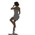 Woman in white dress with brown hair adjusting hair standing elegantly on one leg