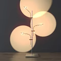 Modern Floor Lamp With Multiple Curved Arms And Circular Light Shadows On Wall