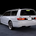 Silver Station Wagon Car With Roof Rack And Sporty Wheels