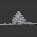 Layered Stone Structure In Snowy Natural Landscape With Green Patches And Rocky Ground
