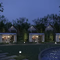 Nighttime Illuminated Villa Style Guesthouses With Lush Trees Lawn And Pool