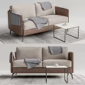 Beige Fabric Two Seater Sofa With Gray Blanket And Small Coffee Table