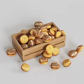 Golden Crispy Pretzels Filled in Wooden Box and Some Scattered Around