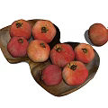 Fresh Ripe Pomegranates In Heart Shaped Wooden Bowl And One Extra On White Background