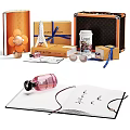Stylish Decorative Accessories Set Featuring Louis Vuitton Boxes Perfume Notebook Sunglasses And Flower Decor
