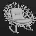 Pink Coral Inspired Rocking Lounge Chair with Intricate Branch Details and Padded Seat