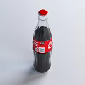 Coca Cola Glass Bottle With Red Label Containing Carbonated Dark Beverage For Daily Use