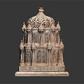 Intricately Carved Multi Layered Stone Building with Dome and Golden Decorations