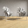 Two Leisure Chairs With Metal Frame And Gray Blanket Against Gray Wall On Wooden Floor