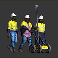 Construction Workers In Yellow Safety Vests Pushing Surveying Equipment With White Hard Hats