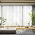 White Window Blinds In Cozy Living Room Interior With Natural Light And Green Plants