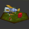Toy Blue And Yellow Biplane On Green Grass With Red Box And Brown Object
