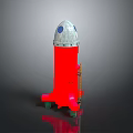Colorful Red Rocket Model With Silver Top Green Wheels And Stand On Dark Surface