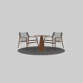 Contemporary Round Wooden Table and Chair Set With Black Leather Seats And Gray Rug